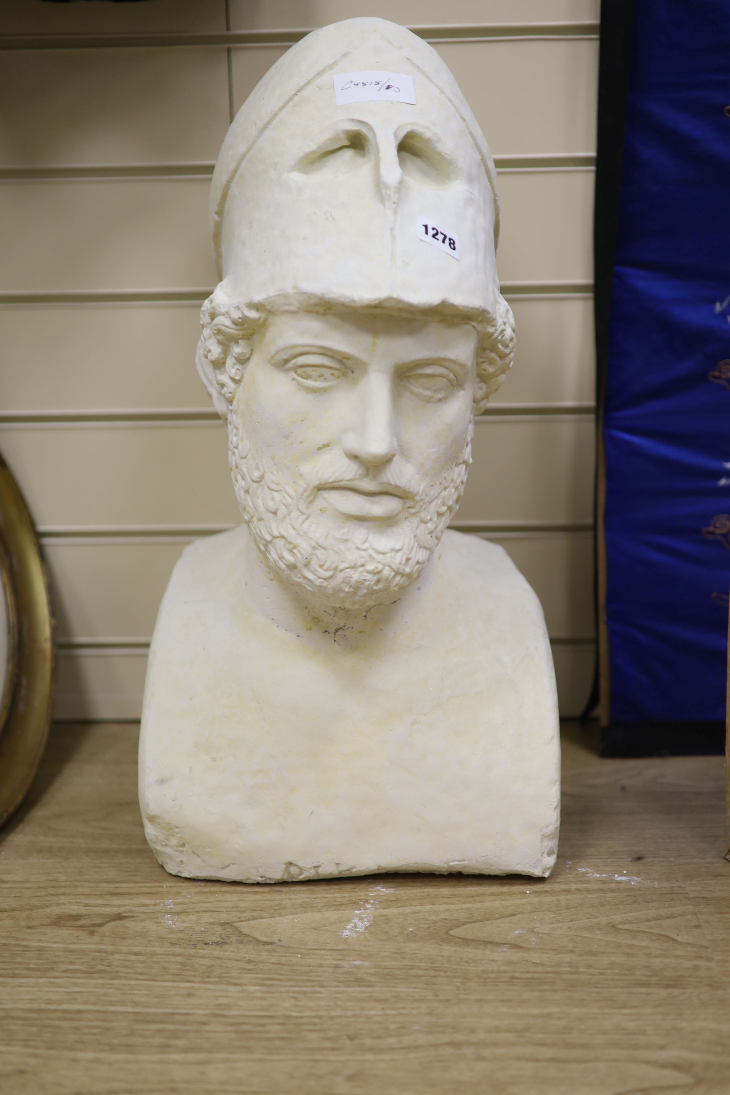 After the Antique. A cast limestone composite bust of a bearded gentleman